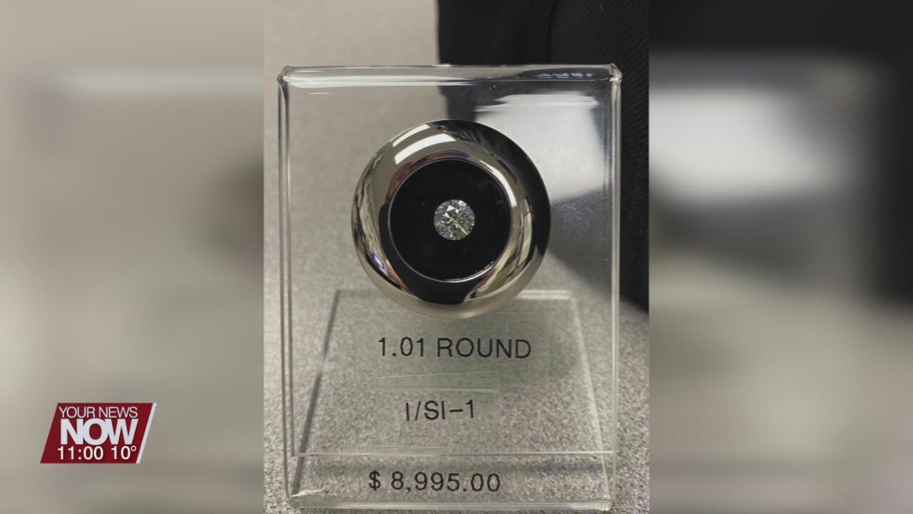 Theft of $9,000 diamond leads to arrest
